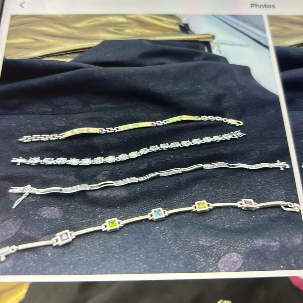 Ladies 7”gently worn bracelets, one is 5 sq. colored stones, oval ss tennis